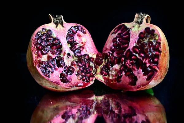 Close up view of fruits on black background