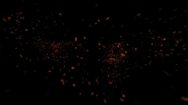Microdeeltjes in de vorm van stof oranje spreiding op een zwarte achtergrond — Stockvideo