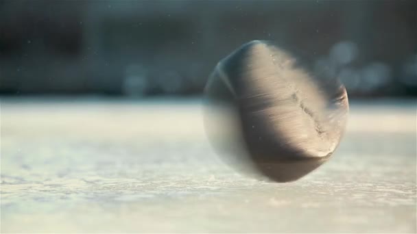 Quick spin of black hockey puck on ice rink HD 1020x1080 — Stock Video