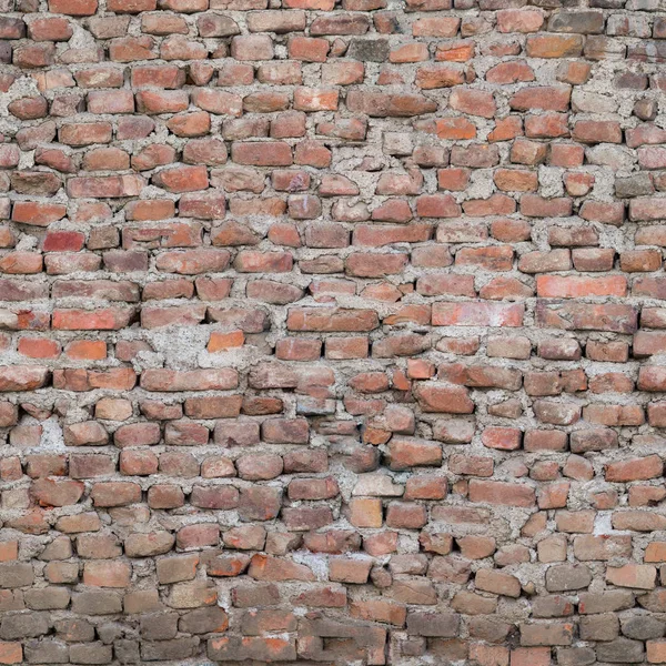 Die rissige alte Wand des Gebäudes besteht aus rotem Ziegelstein. Textur oder Hintergrund — Stockfoto