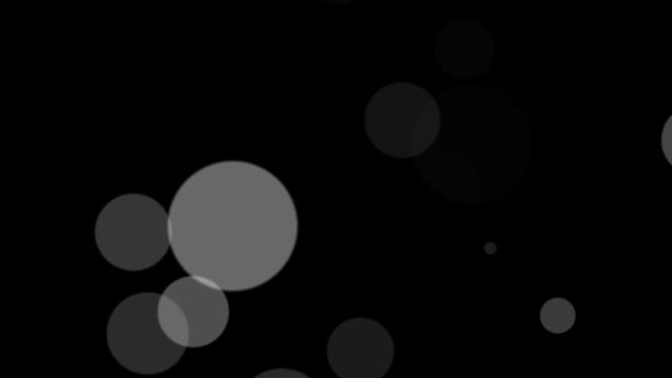 Parry lent dans l'espace de grandes boules grises sur un fond noir 1080 HD — Video