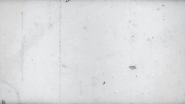 The effect of old film aged by time with scratches and lint on the surface — Stock Video