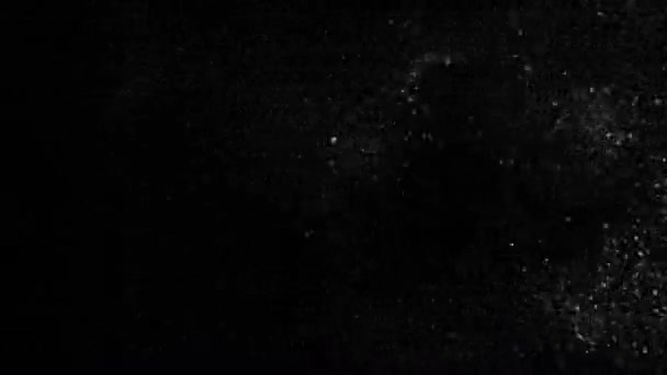 Fliegende Mikropartikel von grauem Feinstaub auf schwarzem Hintergrund HD 1920x1080 — Stockvideo