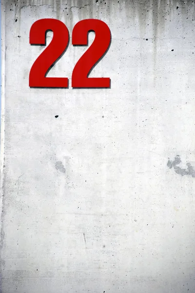Číslo Budování Domu Číslo Číslo Dvacet Dva Pozoruhodné Betonové Zdi — Stock fotografie