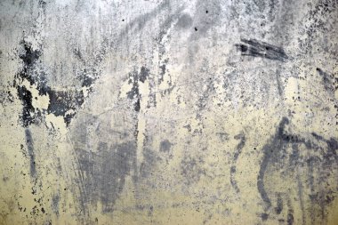 Soyut duvar yüzeyi / sarı bir duvara yakın çekim ile siyah noktalar Duvardaki boya döktüm.     