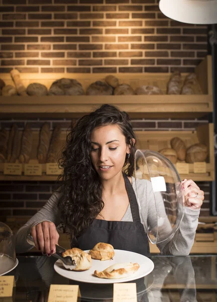 Young Woman Bakery Stock Photo