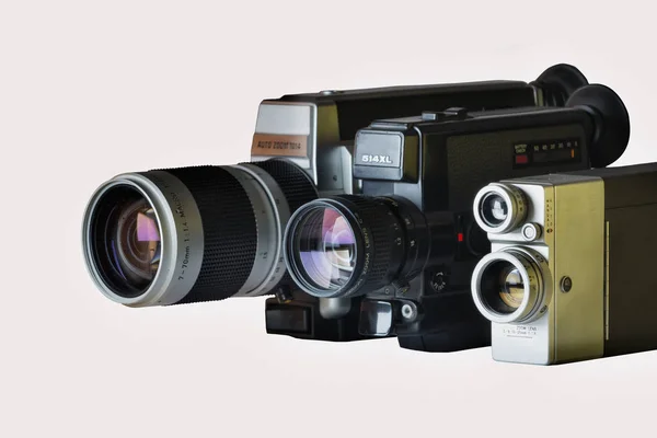 Drei Filmkameragehäuse Mit Zoomobjektiv Auf Weißem Hintergrund Die Ikonischen Kameras — Stockfoto