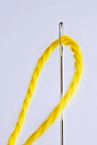 One Sewing Needle Yellow Thread Eyelet Long Tool Hole One Stock Image