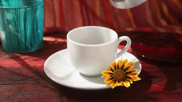 Pouring Coffee White Cup Neapolitan Flip Coffee Pot Orange Flower — Stock Video