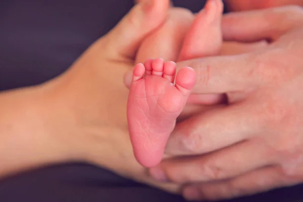 Newborn Baby Feet Parents Hands Holding Caring — Stock Photo, Image