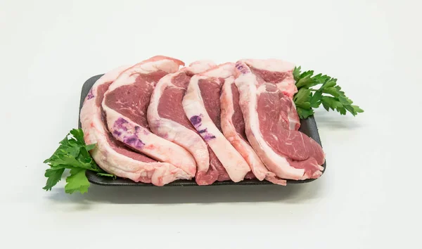 Mutton lamb meat cut pieces from half a lamb chop loin
