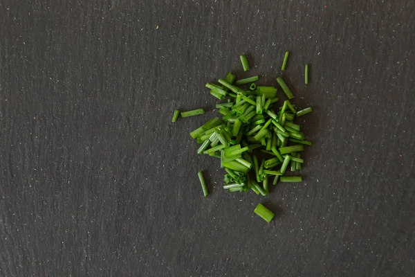 Chives Herb Chopped Black Slate Plate Background — Stock Photo, Image