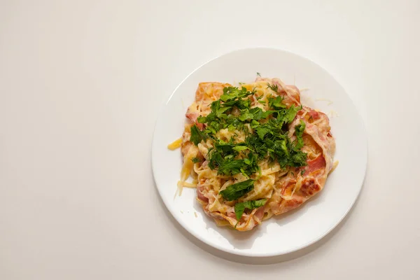pasta Carbonara cooked at home according to the Italian recipe