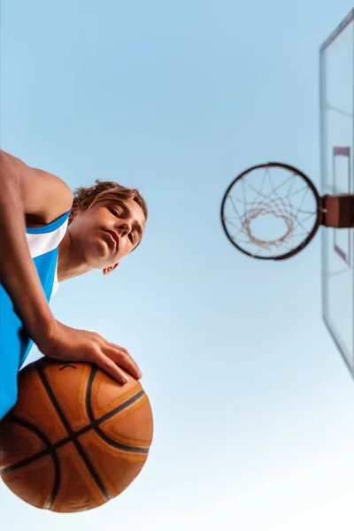 Basketball Teenager Blue Sportswear Holds Ball His Hands Looks Bottom — Stock Photo, Image
