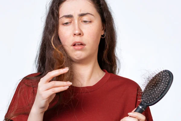 Close Portrait Saddened Brunette Woman Holds Comb Hair Falling Out — Stock Photo, Image
