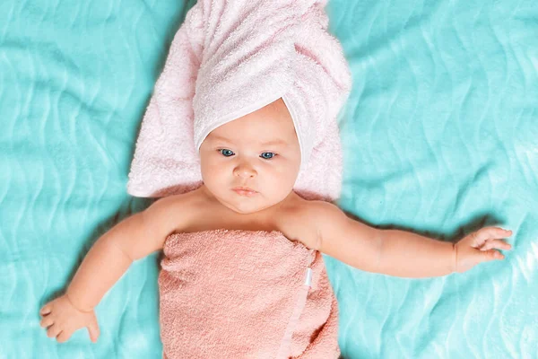 Portrait Cute Baby Wrapped Pink Towel Lying Blue Sheet View — Stock Photo, Image