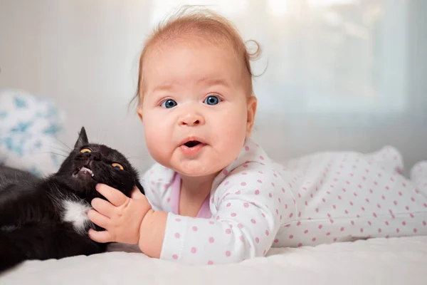 Portrait Funny Baby Playing Cat Bed White Interior Background — Stock Photo, Image