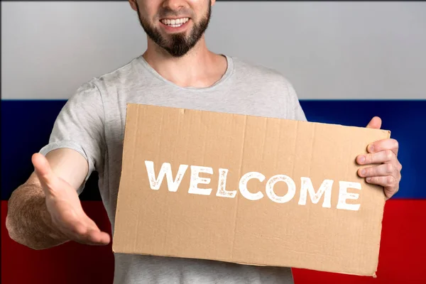 Concept Tolerance Immigrants People Different Life Positions Man Holds Cardboard — Stock Photo, Image