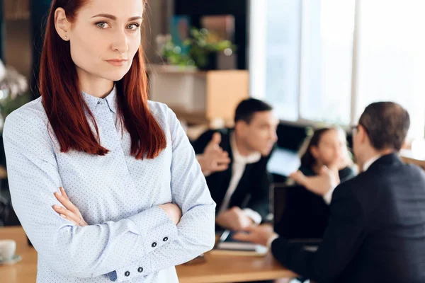 woman in blue shirt standing in office of lawyer, couple divorce