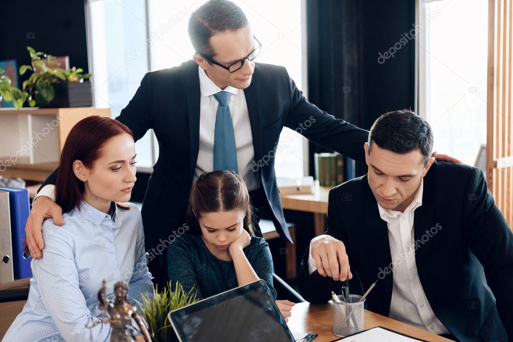 Lawyer calming family with little girl who getting divorced