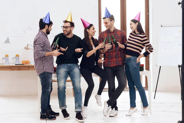 Young Employees Company Celebrate Corporate Holiday Put Holiday Caps Have — стоковое фото