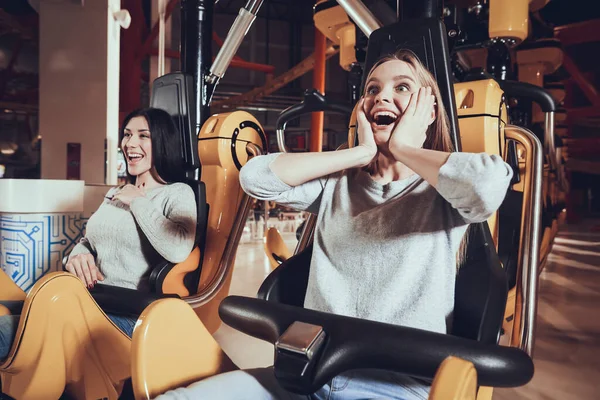 Girl smiles while riding a roller coaster. — Stock Photo, Image