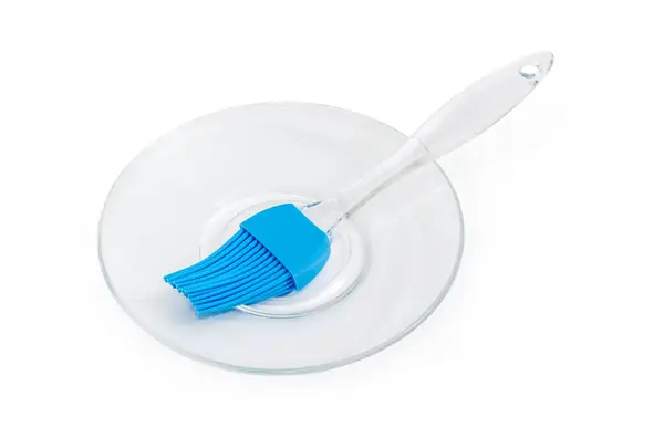 Modern Pastry Brush Blue Silicone Bristles Transparent Plastic Handle Glass Stock Photo