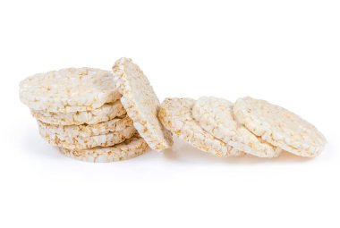 Kuru yuvarlak kahvaltılık crispbreads kahverengi pirinç beyaz zemin üzerine yapılan