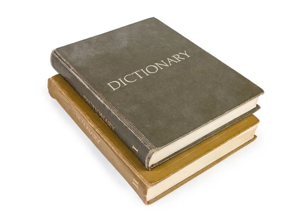 两卷大老精装字典与布料盖子在白色背景 — 图库照片