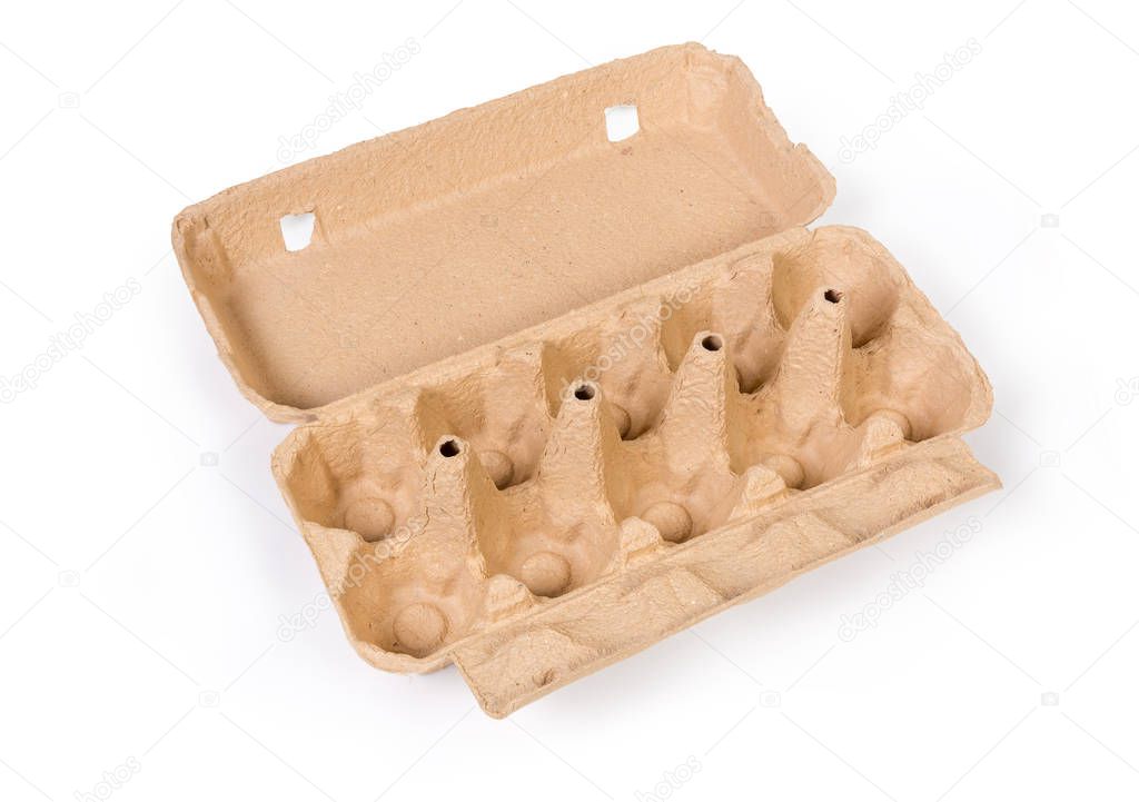 Open empty egg carton for ten eggs made of recyclable paper pulp on a white background