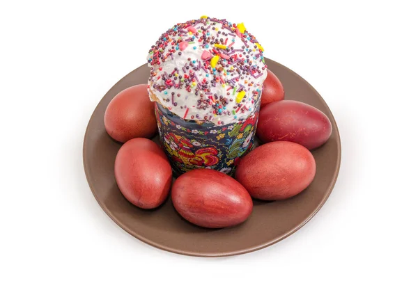 Ovos de Páscoa e pão de Páscoa doce em prato marrom — Fotografia de Stock