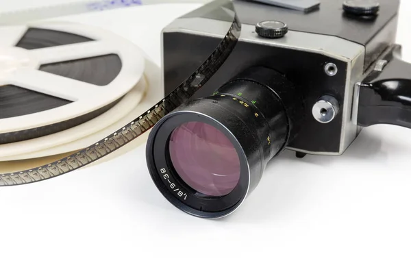 Vintage amateur movie camera and reels of Super 8-mm films