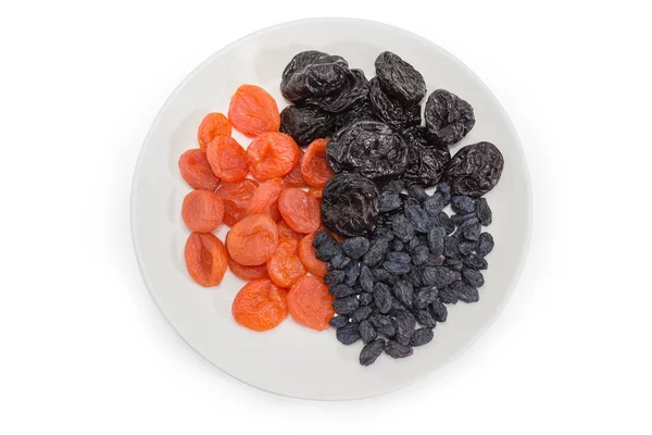 Vista superior de diferentes frutas secas tradicionales en el plato — Foto de Stock