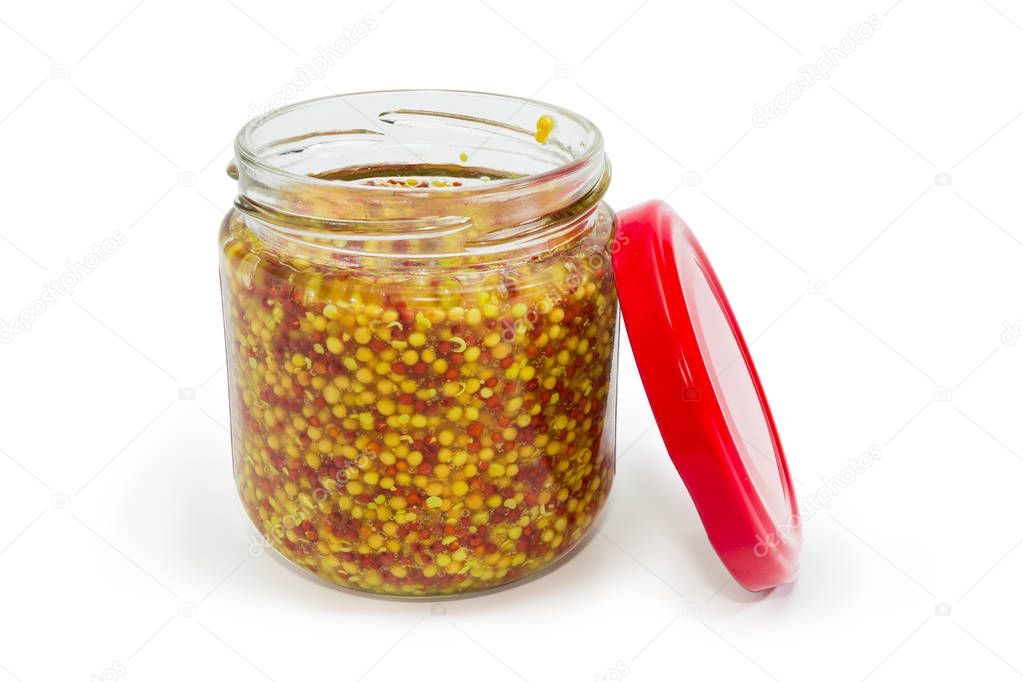 French mustard in glass jar with open lid