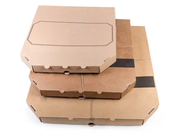 Three different pizza in the closed cardboard boxes — Stock Photo, Image