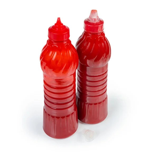 Sos pomidorowy w dwóch plastikowych butelkach na białym tle — Zdjęcie stockowe