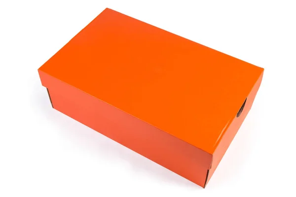 Πορτοκαλί κλειστό χάρτινο κουτί παπουτσιών σε λευκό φόντο — Φωτογραφία Αρχείου