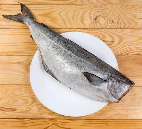 Bovenaanzicht van RAW koolvis zonder kop, gereinigd van weegschalen — Stockfoto