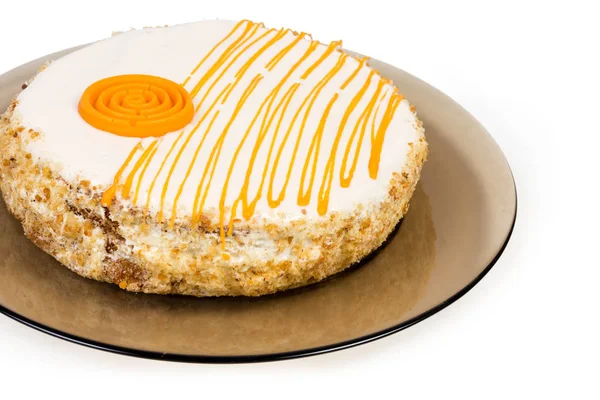 Round cake with decoration orange color on glass dish — Stock Photo, Image