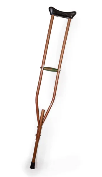 白い背景に古い金属の脇の下の松葉杖 — ストック写真