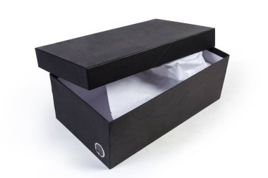 Black cardboard shoes box with partly open lid and wrapping paper inside on a white background clipart