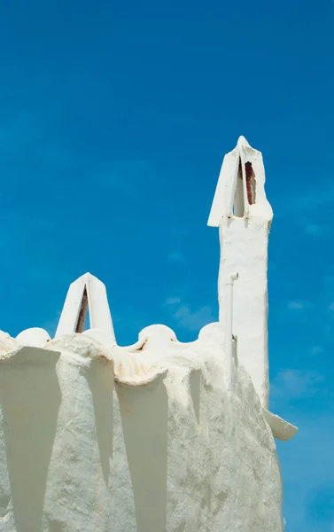 White chimneys of the little fisherman town of the spanish island