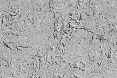 Beyaz renklerde ve deliklerle boyanmış eski beton duvarın güzel yatay dokusu