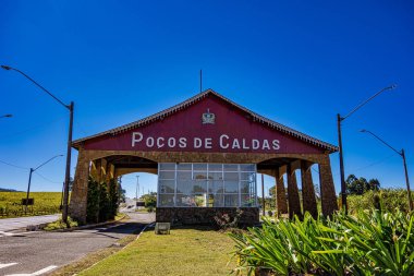 POCOS DE CALDAS, MINAS GERAIS, BRAZIL - JULY 7, 2019 : Entrance portico of POCOS DE CALDAS city clipart