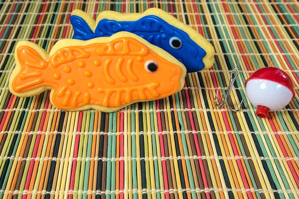 Blue Orange Icing Fish Cookies Fishhook Fishing Bobber Striped Bamboo — Stock Photo, Image