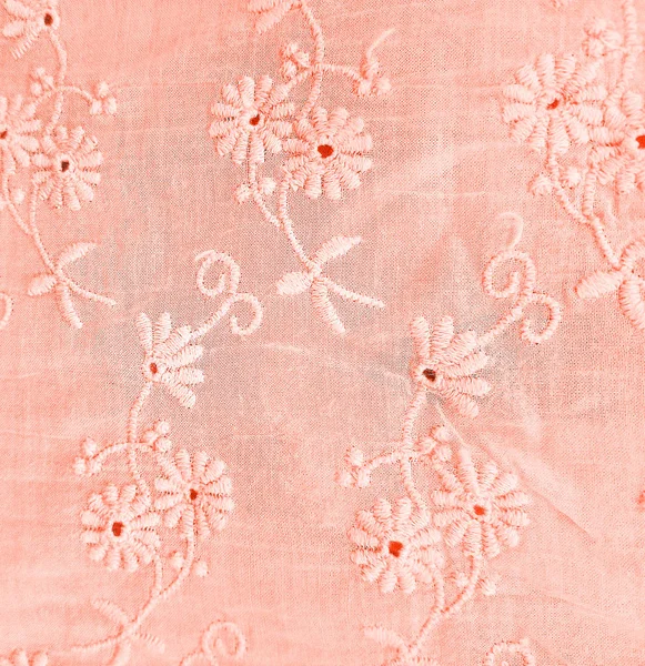 Close Coral Colored Embroidered Eyelet Pattern Fabric — Stock Photo, Image