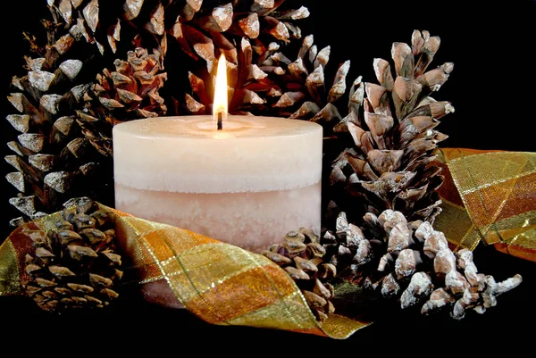 Glowing Candle Autumn Pine Cones Plaid Ribbon — Stock Photo, Image