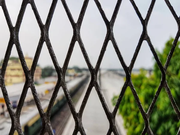 View Blurred Sky Railway Station Diamond Shaped Grill — Stock Photo, Image