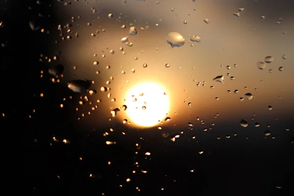 Makro Fotografia Deszcz Spada Szybie Tle Rozmazany Zachodzącego Słońca Tekstury — Zdjęcie stockowe