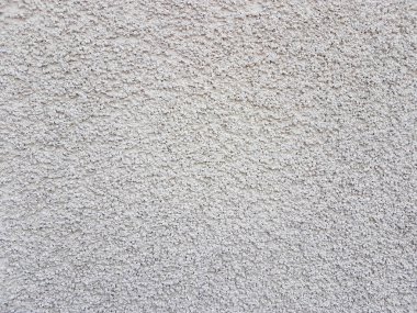 Gümüş kabartma doku. Arka plan gri beton duvar.